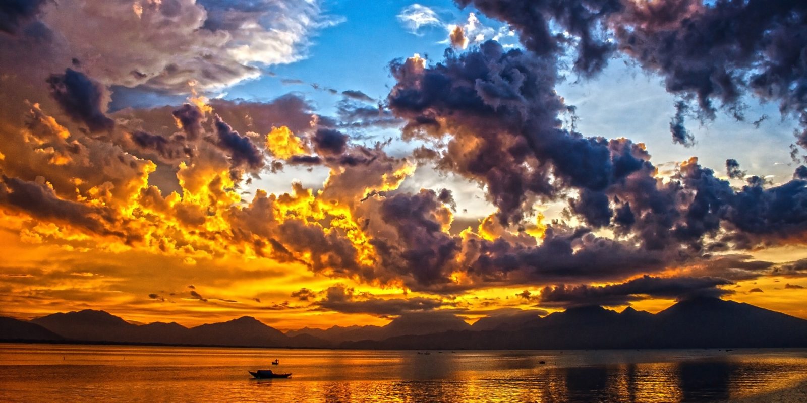 Sunset over Da Nang Bay, near My Khe Beach, Vietnam.